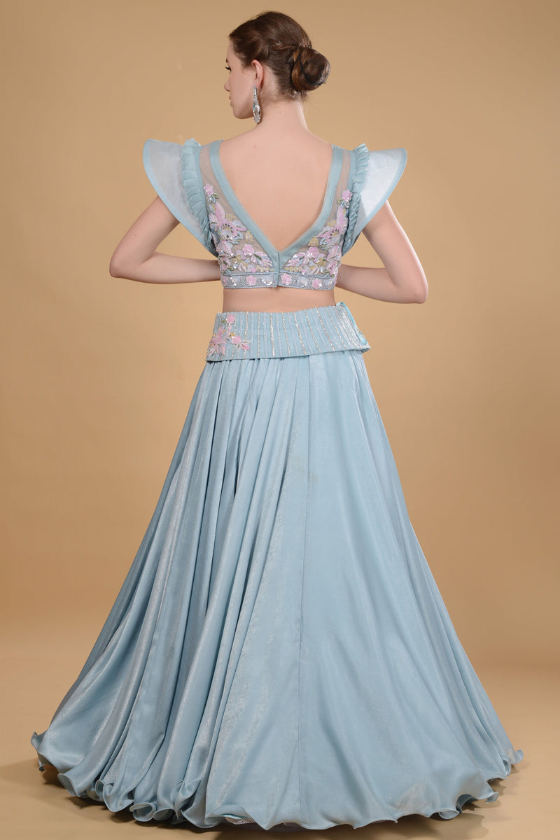 Light blue crop top and long skirt set.