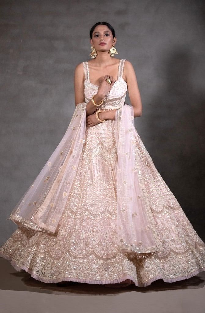 Sara Ali Khan turns 'Desi Barbie' in silver halter neck bustier with pink  lehenga | Times of India